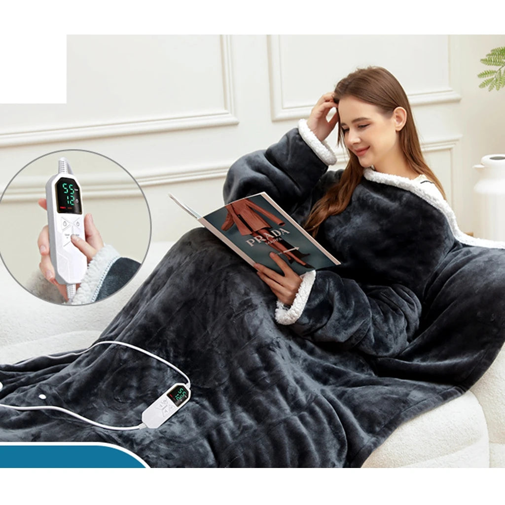 Woman reading on a sofa wearing a wearable heated blanket with sherpa lining